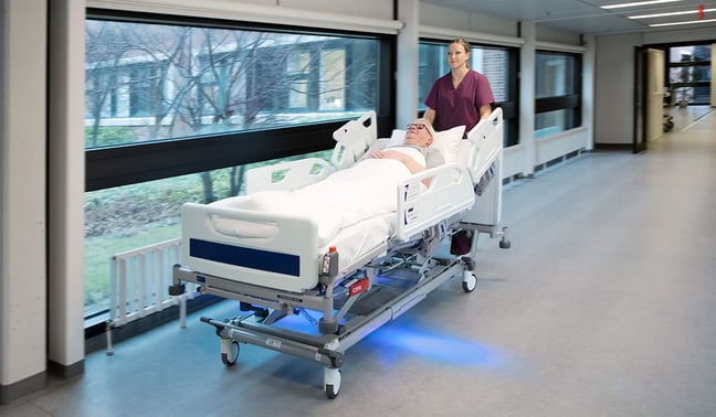 arjo-blog-us-transporting-patients-in-bed-indigo-img